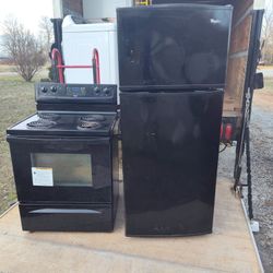 Whirlpool Black Stove And Refrigerator
