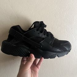 Black Nike running shoes