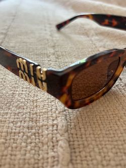 MIUMIU SUNGLASSES