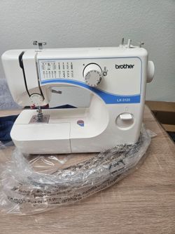Maquina de coser domestica