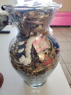 Five Glass Vases Stuffed Full Of Jewelry