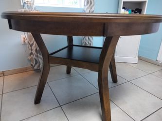 Round Wood Dining Table with Lower Shelf
