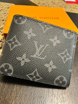 Source unknown Black and grey men’s wallet