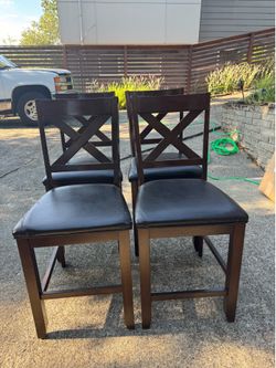 4 solid heavy wood bar stools