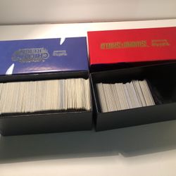 Two Boxes Filled With Pokemon Cards