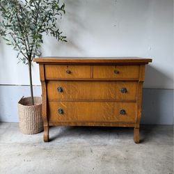 Timeless Antique Oak Dresser with Warm Wood Grain