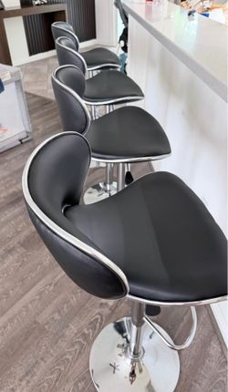 4 bar stools with leather seats