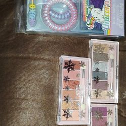 NEW NUEVOS Eyeshadow Palettes, and a set of 2 bobby pins, 2 hair spirals, hair elastics, star unicorn star loose glitter, and glitter mascara. $4 each