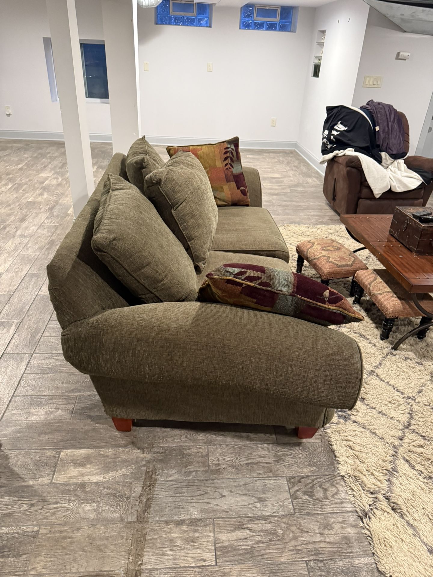 Green Sofa, Loveseat, Including Our Pillows. Optional Area, Rug, Sofa, Table, And Foot Stools.