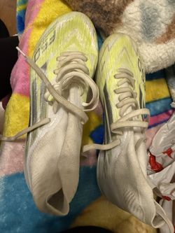 F50 SPARKFUSION ELITE MID CUT FIRM GROUND CLEATS