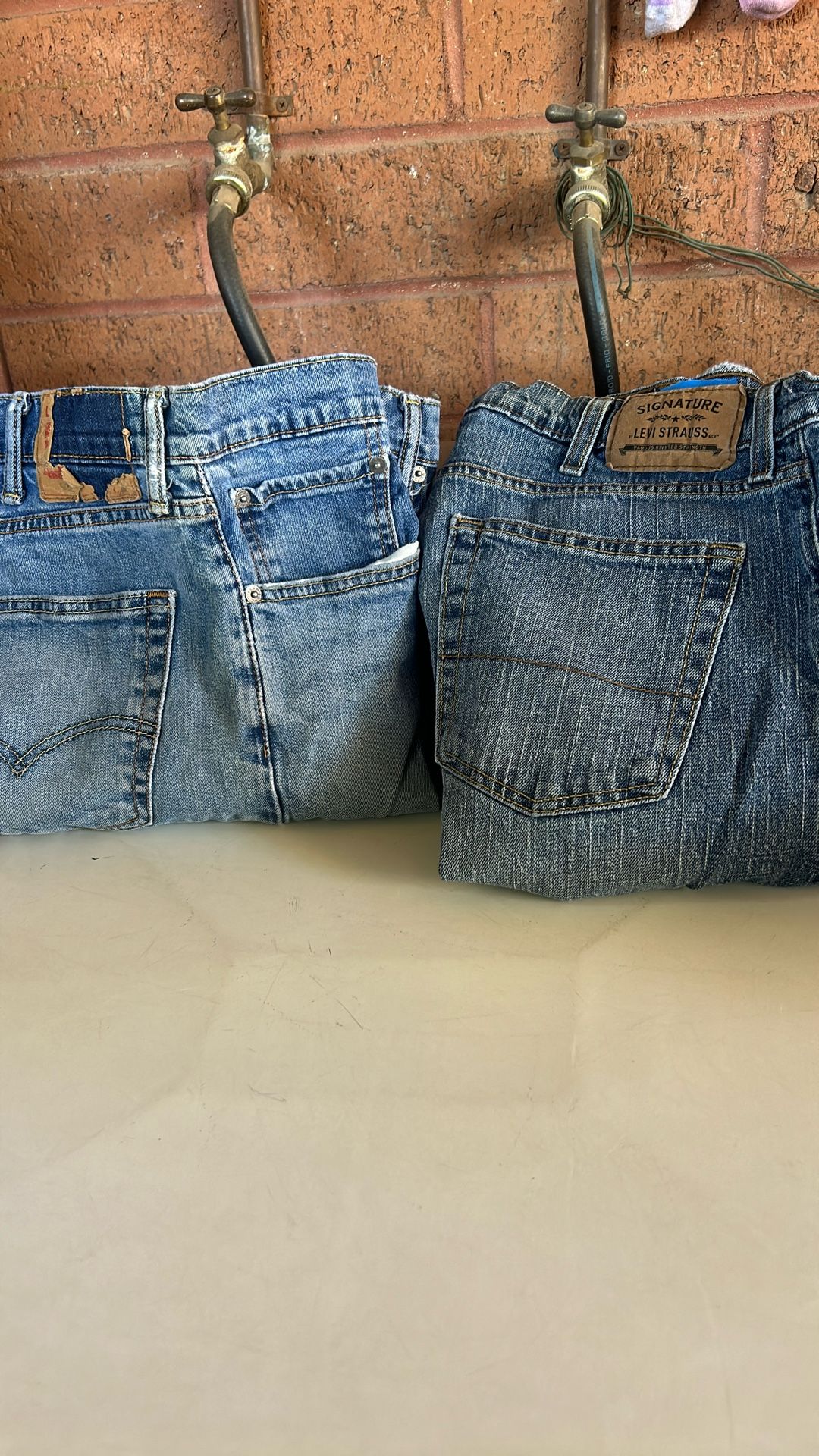 2 Work Levi Pants 38x 30. Both