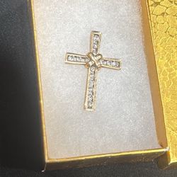 Beautiful 10k Cross pendant with diamonds