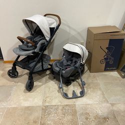Nuna Mixx Stroller With Car Seat White Canopy