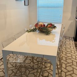 CB2 Aqua Virgo 100” High-Gloss Dining Table + 10 Acrylic Chairs – $2,500