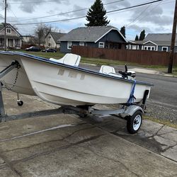 12’ Livingston titled trailer and 15 hp Johnson