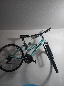 New huffy bike and mini working refrigerator for sale.