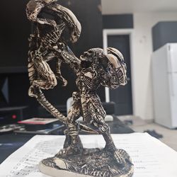 Predator vs alien carves from bone