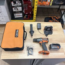 Like New RIDGID 18V Brushless Cordless 1/2 in. Hammer Drill/Driver Kit with 4.0 Ah MAX Output Battery, 18V Charger, and Tool Bag