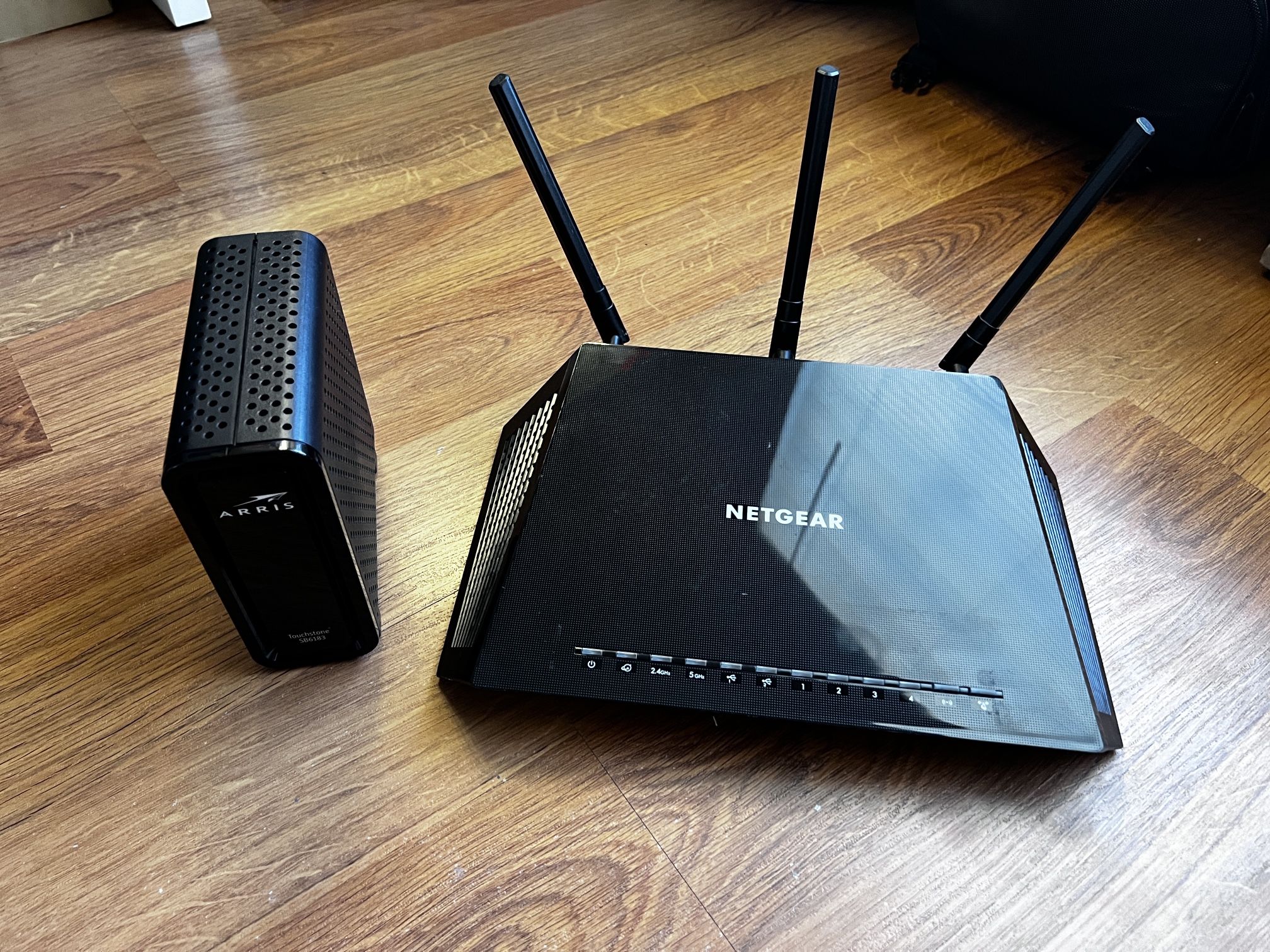 Netgear Router and Arris Modem (cables Included)