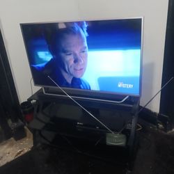 55 Inch TV With Stand