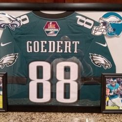 DALLAS GOEDERT OF THE SUPER BOWL CHAMP PHILADELPHIA EAGLES STITCHED BRANDED AUTHENTIC FRAMED JERSEY.
