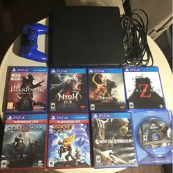 PS4 Slim 1TB w/ 8 games and controller