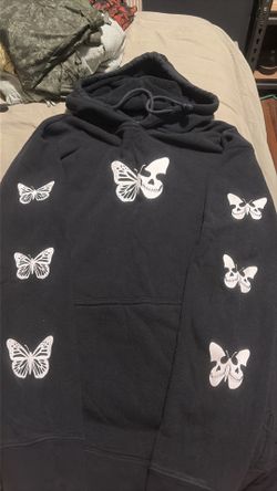 Half butterfly half skull sweater