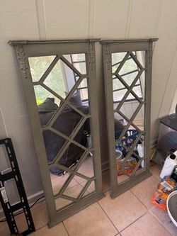 Two hanging decor mirrors