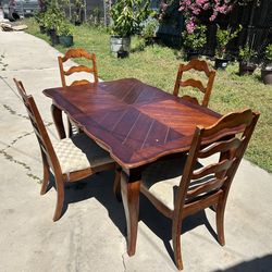 Dining table and chairs set