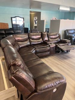 New power sectional sofa with three power recliners on sale still