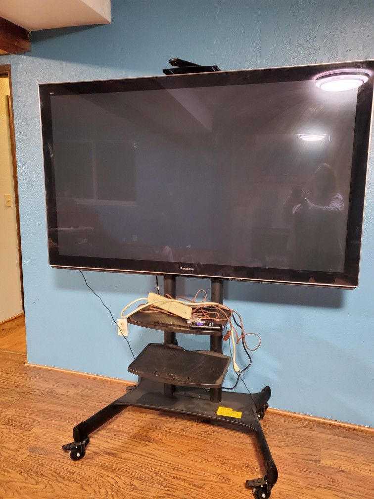 64" TV On Quality Mobile Stand - Perfect