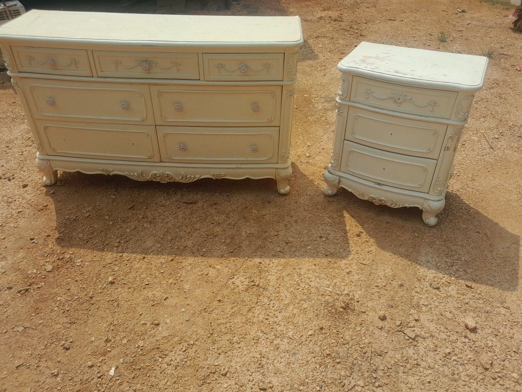 Vintage Solid wood claw foot dresser and matching night stand. 