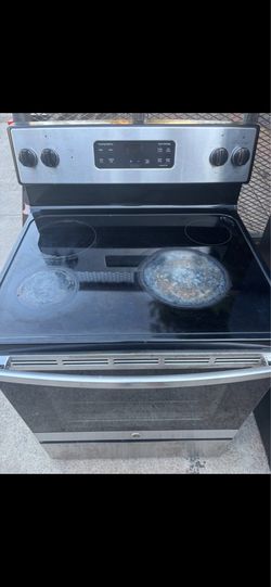 Working electric stove will deliver and install