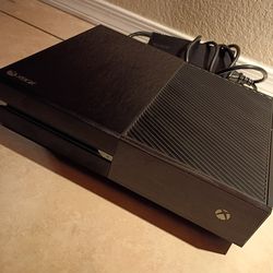 Xbox One Console With A Controller And Games