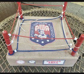 Vintage 1985 American Wrestling Association (AWA) wrestling ring (price $40) part of rope broken
