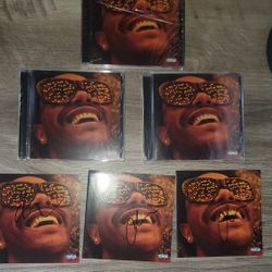 The Weeknd Autographed Heartless/Blinding Lights CDs