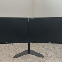 $250 - (2) 23” LG Monitors with stand 