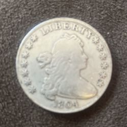 1804 Liberty Dollar Good Condition Has Scribble At The Sharp Edge