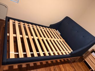 Crate & Barrel navy upholstered bed frame