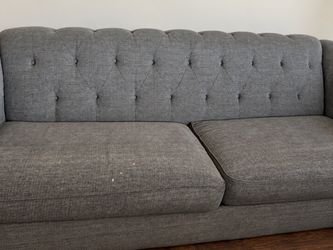 Free sofa this couch is extra long and has just a few little spots