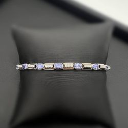 14k solid white gold 1.35 CTW Diamond 6 CTW Tanzanite 7.5” Tennis bracelet 5 mm 11.9 grams