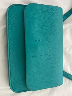 Turquoise leather crossbody bag with credit card ID slots