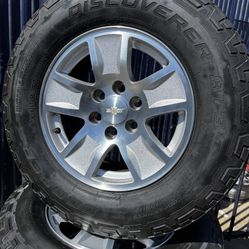 SET OF FOUR 17” CHEVY GMC WHEELS AND TIRES