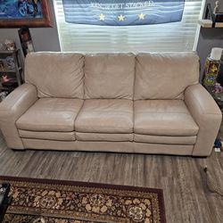 Matching Leather Couch, Recliner And Footrest. 