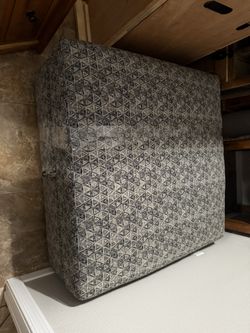 Ottoman. Cushioned With Open Lid Compartment