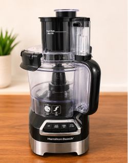 This is a Hamilton Beach 10-Cup Food Processor (Model 70723G) featuring "Stack & Snap" assembly for easy setup. • It has a 450-watt motor and features