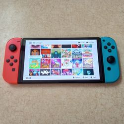 NINTENDO SWITCH OLED Loaded With 120 POPULAR SWITCH GAMES