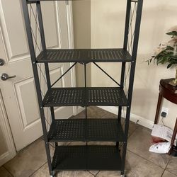 🛠️ 5-Tier Heavy-Duty Folding Metal Storage Shelves – Organize with Ease! 🏡  📍 Pickup Location: Durango/215 by IKEA  📦 Brand New – Perfect for Gara