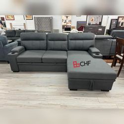 Sleeper sectional sofa with storage chaise and cup holders