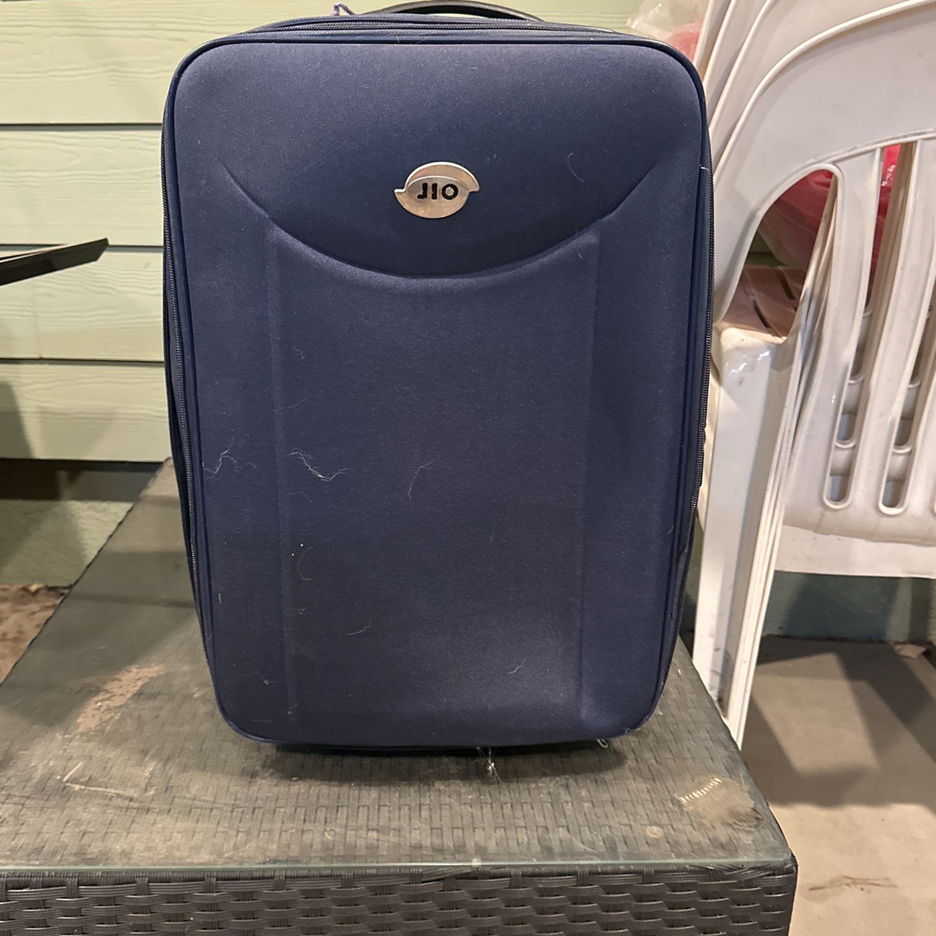 Used Navy Blue Carry On Size Roller Bag